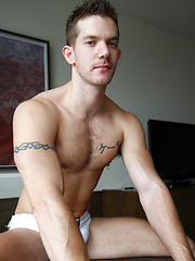 Hunky mate Skippy Baxter strips out of his footy gear by Bentley Race image #6