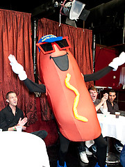Slinging sausages at this party