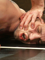 Two naked hot studs battle it out in a wild match that ends with a hard fuck and leaves everyone satiated and covered with cum.