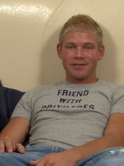 Cute blonde guy stripping down