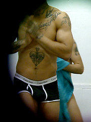 Great looking guy dressing after a shower