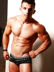 strong muscular guy posing