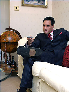 Horny Marcello wearing a pin stripe suit with bare feet and masturbating by With Marcello by With Marcello image #1