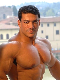 Tarek posing outdoors by Muscle Gallery by Muscle Gallery image #4