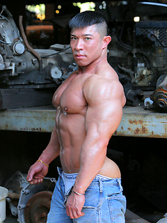 Muscled asian man Daryl Gee posing