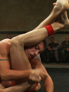 Four hot studs in a testosterone fueled tag team match in front of a live audience. Who will win and who will gave their hole pounded into oblivion? by Naked Kombat by Naked Kombat image #6