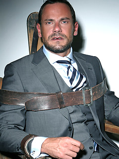 Hary hunk Jason Torres in a torture chair