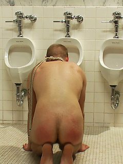 Riley Vicek makes his first appearance on video and he gets humiliated and gang-banged in the public toilet. by Bound in Public by Bound in Public image #2