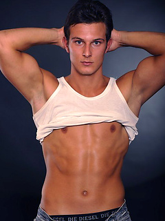 Hot brunette stud posing naked and shows his butt