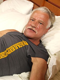 Silver daddy Dean Young shows his uncut cock