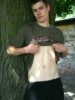 Hot twink posing outdoors