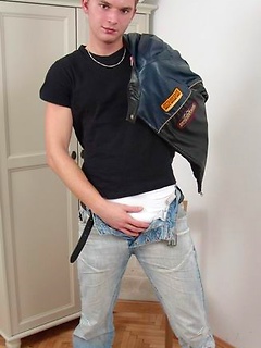 Horny twink plays with cock