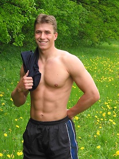 Hot muscle stud posing naked outdoors