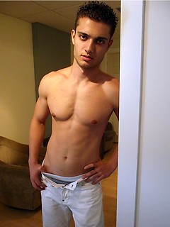 Rocco plays with cock