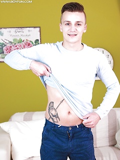 Tattooed Dom Ully busts a big nut over his stomach. by BF Collection by BF Collection image #3