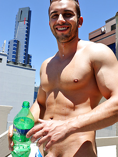 James Nowak strips out of his rugby gear on the roof by Bentley Race by Bentley Race image #13