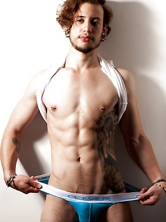 Marco showing his body on balcony