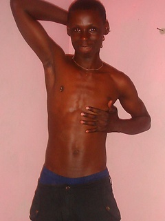 Genuine African lad, with a huge uncut cock, goes solo for our pleasure.