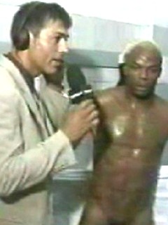EricDeman catches a hot footballer in the locker room adjusting his towel just before being interviewed and inadvertently revealing his big wet cock.