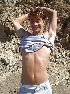 Sexy teen shoots a hot load all over his tight young body.