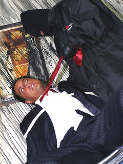Marcello is tied up in a burnt out house by a masked man, who then apologises by licking his feet and sucking his big hard cock by With Marcello by With Marcello image #4