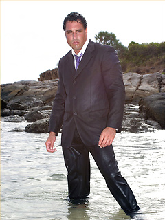 Marcello wearing a soaking wet business suit wanking on the rocks by With Marcello by With Marcello image #3