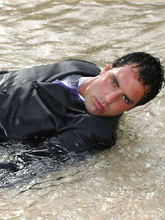 Marcello wearing a soaking wet business suit wanking on the rocks by With Marcello by With Marcello image #5