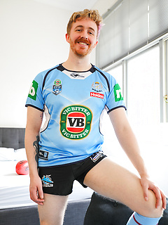 Aussie Tomas Kyle strips out of his footy gear by Bentley Race by Bentley Race image #2