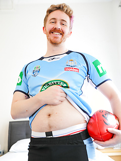 Aussie Tomas Kyle strips out of his footy gear by Bentley Race by Bentley Race image #3