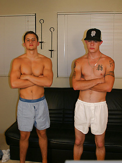 Horny twinks Rey Gold & Kane strip naked and masturbate together on the sofa