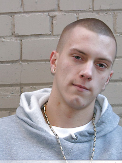 Shaved-headed stud Nick shows his inked body while masturbating on the bed by Nextdoor Buddies by Nextdoor Buddies image #1