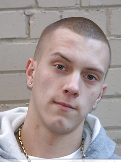 Shaved-headed stud Nick shows his inked body while masturbating on the bed by Nextdoor Buddies by Nextdoor Buddies image #2